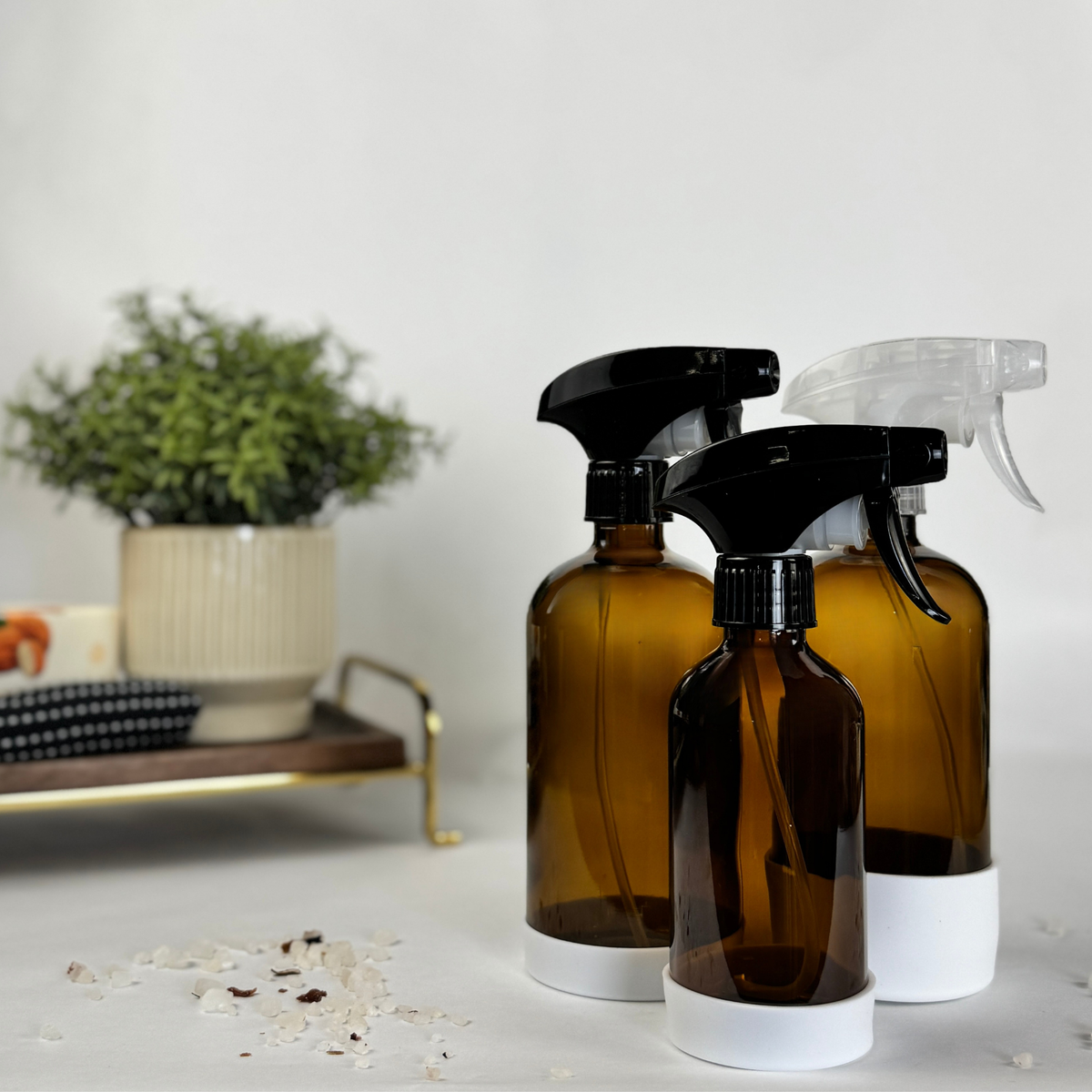 Amber Glass Dispenser with Silicone Sleeve showing spray top options