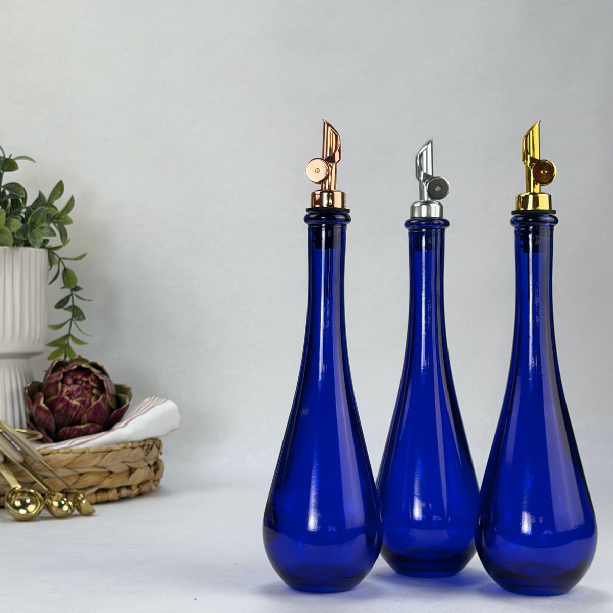 Raindrop Cobalt Blue Recycled Glass Apothecary Bottle showing pour spout option