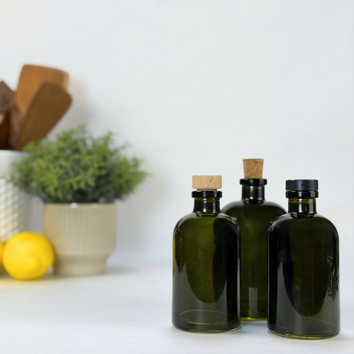 Vintage Green Apothecary Glass Bottle showing ceramic tag detail