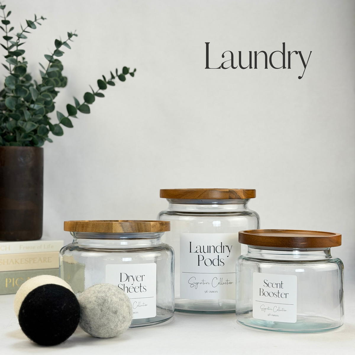 Montana Glass Storage Jar with Wood Lid - Custom Label showing styled laundry room view